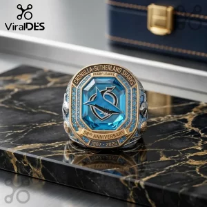 Cronulla-Sutherland Sharks 59th Anniversary Ring with a large blue center stone, gold accents, and detailed team emblem.
