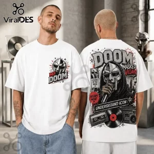 MF DOOM Masked Villain Hip Hop white T-shirt featuring a front chest logo and a large detailed back graphic illustration.