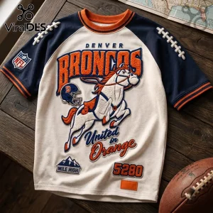 Denver Broncos 5280 Mile High embroidered shirt featuring a white horse logo, orange text, and blue raglan sleeves.