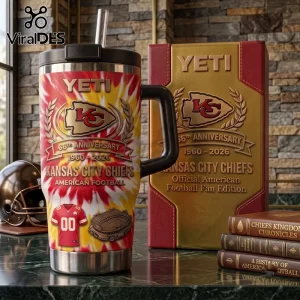 Kansas City Chiefs Tie-Dye 66th Anniversary Stanley Tumbler with a red and gold football jersey graphic on a stone surface.
