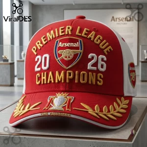 Arsenal Football Club 2026 Champions Premier League baseball cap in red and white with gold embroidered trophy detailing.