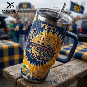 Notre Dame Fighting Irish 184th Anniversary Tumbler with blue and gold swirl pattern, metal straw, and team logos.