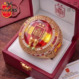 Spain National Football Championship Gold Ring featuring a red and yellow centerpiece with Spanish crests in a display box.