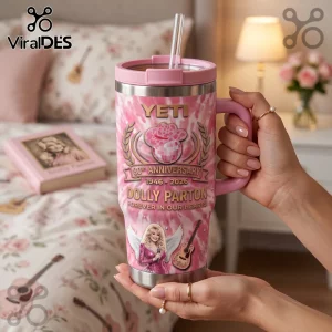 Dolly Parton 80th Anniversary Pink 40oz Handle Tumbler with rhinestone cowboy hat, angel wings, and guitar graphics.