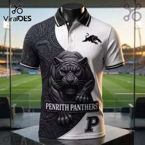 Penrith Panthers Mascot Black and White Polo Shirt with 3D panther graphic, indigenous art pattern, and rugby field backdrop.