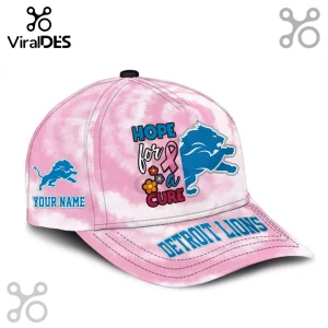 Detroit Lions Breast Cancer Awareness Custom Name Cap in pink tie-dye with team logo, text, and ribbon graphic.
