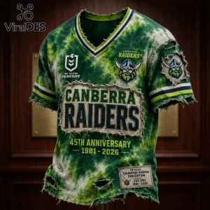Canberra Raiders 1981-2026 Anniversary Distressed Shirt in green tie-dye with frayed edges and rugby league team logos.