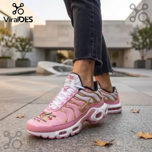 Dolly Parton Limited Edition Pink Air Max Plus shoes with gold wave overlays and custom Dolly text on the tongue.