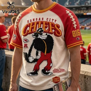 Kansas City Chiefs NFL Mascot Embroidered Shirt featuring a wolf graphic, red sleeves, and team text on cream fabric.