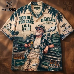 NFL Philadelphia Eagles Mascot Hawaiian Shirt featuring a bearded man, palm trees, Philly Pilsner text, and team logos.