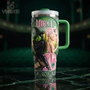 Wicked Defy Gravity Stanley Tumbler 40oz featuring Elphaba and Glinda illustrations on a green and pink background.