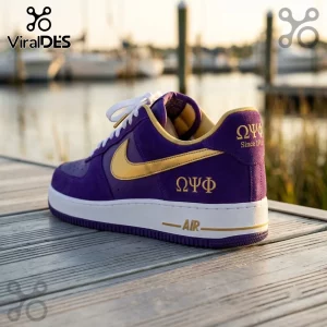 Omega Psi Phi Purple Suede Air Force 1 Sneakers with gold swoosh, Greek letters on heel, and white rubber midsoles.