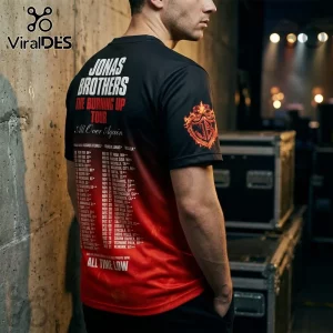Jonas Brothers Burning Up Tour black shirt with red gradient, white concert dates, and crest logo on the sleeve.