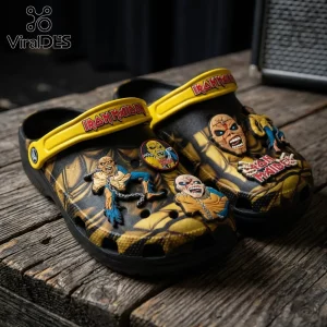 Iron Maiden Eddie Mascot Crocs Clogs Shoes featuring black and yellow graphic prints with 3D Eddie character charms.