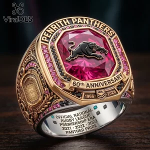 Penrith Panthers 60th Anniversary Gold Ring featuring a large red center stone, black panther emblem, and rugby field detail.