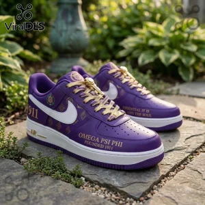 Omega Psi Phi Fraternity Purple Air Force 1 Sneaker with white swoosh, gold laces, and Greek lettering on stone path.