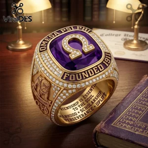 Omega Psi Phi Howard University Bulldog ring in gold with a purple stone, Omega symbol, and Cardinal Principles engraved.