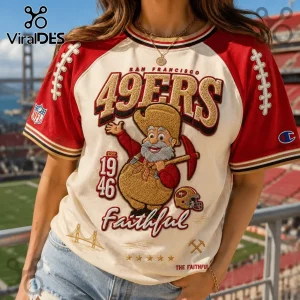 San Francisco 49ers Mascot 1946 Patch Shirt featuring a cartoon miner graphic, red raglan sleeves, and embroidered details.