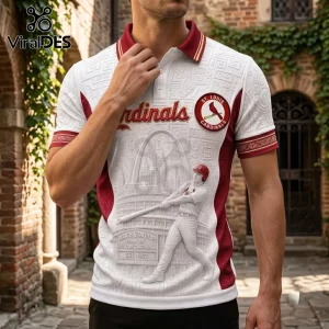 St. Louis Cardinals Busch Stadium Embossed Polo Shirt with white textured fabric, maroon collar, and baseball player graphic.