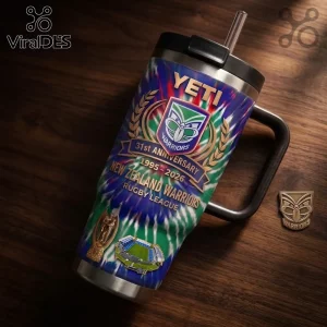 New Zealand Warriors 31st Anniversary 40oz Tumbler with team logo, stadium graphic, and blue and green tie-dye patterns.