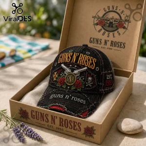Guns N' Roses Vintage Distressed Embroidered Baseball Cap in black fabric featuring red roses and pistol motifs in a box.