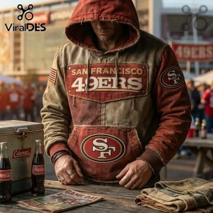 San Francisco 49ers Weathered Canvas Pullover Hoodie featuring distressed red and tan fabric with team logos and patches.