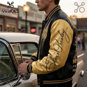 Elvis Presley 90th Anniversary Black Gold Baseball Jacket with gold satin sleeves and black leather chest branding.