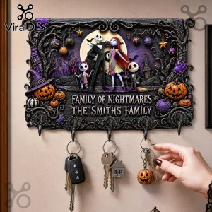 Nightmare Before Christmas 2026 Key Holder featuring Jack, Sally, and characters with Family of Nightmares text on a board.