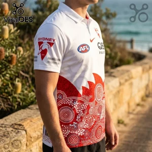 Sydney Swans AFL Indigenous 2026 Polo Shirt featuring red and white traditional dot patterns and team branding.