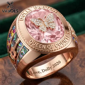 Dolly Parton Queen of Country butterfly ring in rose gold with a large pink gemstone and guitar side inlay details.