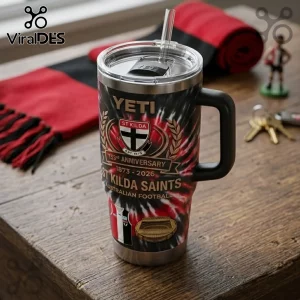 St Kilda Saints 153rd Anniversary YETI Stanley Tumbler featuring team logo, red and black tie-dye pattern, and straw lid.