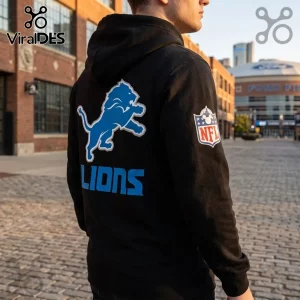 Lion King x Detroit Lions NFL Collaboration black hoodie featuring a blue lion logo on the back and a Disney NFL patch.