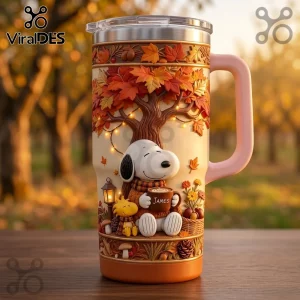 Snoopy Personalized Autumn Leaves Tumbler featuring a cartoon dog and bird under a fall tree with a warm lantern glow.