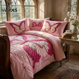 Dolly Shine Like a Butterfly Pink 3-Piece Bedding Set featuring butterfly motifs, text, and floral accents on pink fabric.