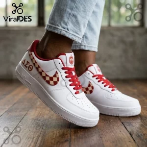 Delta Sigma Theta Nike Air Force 1 Sneakers featuring white leather, red laces, and checkered crimson Greek lettering.
