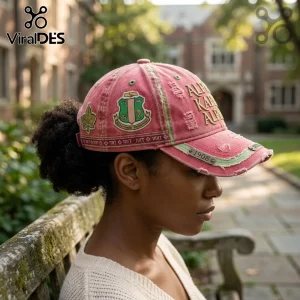 Alpha Kappa Alpha Pink Distressed Baseball Cap with embroidered crest, 1908 metal plaque, and frayed edges on cotton fabric.