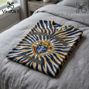 Knights of Columbus EST1882 tie dye t-shirt featuring a gold and navy spiral pattern and a central K of C emblem.