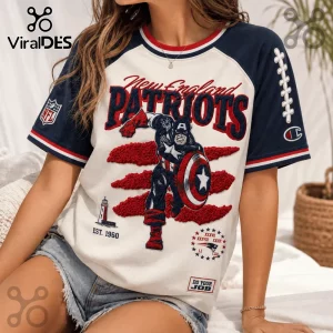 New England Patriots x Captain America vintage embroidered shirt with red, white, and blue team-themed comic graphics.