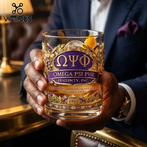 Omega Psi Phi 1911 Gold Trimmed Whiskey Glass featuring purple and gold Greek lettering, ornate filigree, and jewels.