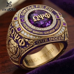 Omega Psi Phi Fraternity Bulldog Ring with purple center stone, gold lettering, and Greek symbols on a velvet surface.