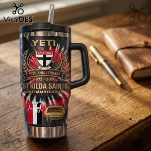 St Kilda Saints 153rd Anniversary YETI Stanley Tumbler featuring team crest, jersey graphic, and stadium art on a desk.