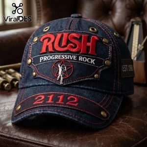 Rush 2112 Starman Distressed Denim Cap featuring red embroidery, brass studs, and iconic band branding on dark fabric.