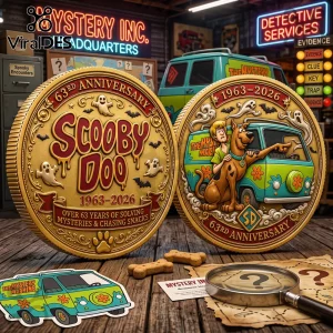 Scooby Doo Mystery Machine 63rd Anniversary Coin showing relief art of Shaggy, the van, ghosts, and bats in metallic gold.