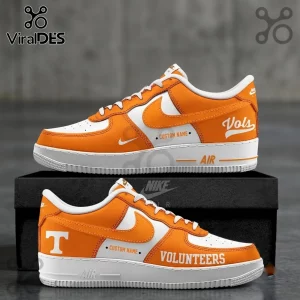 Tennessee Volunteers Nike Air Force 1 sneakers in orange and white leather with custom name text and university branding.