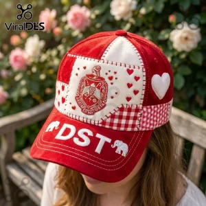 Delta Sigma Theta Patchwork Red Baseball Cap featuring white heart embroidery, DST lettering, and a crimson sorority crest.