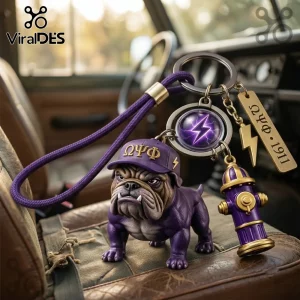 Omega Psi Phi Bulldog Mascot Purple Keychain featuring a bulldog in a purple cap with Greek letters and a fire hydrant charm.