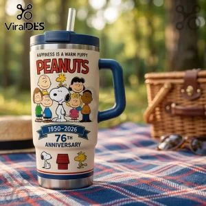 Peanuts 76th Anniversary Snoopy and Friends Stanley Tumbler featuring colorful character graphics on a cream background.