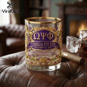 Omega Psi Phi 1911 Gold Trimmed Whiskey Glass featuring purple enamel, Greek lettering, and jewel-toned embellishments.
