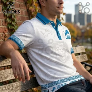 Detroit Lions White One Pride Polo Shirt featuring blue collar, lion logos, and Greek key trim on sleeves and hem.