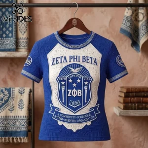 Zeta Phi Beta Sorority Royal Blue Shirt featuring a white central crest, Greek letters, and ornate embossed scroll patterns.